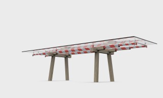 It shows the origin of the concept of the Tracks table:  railroad crossing gates, signage found on construction sites, graphics found in circus world....