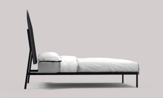 a head board with an angled position provides extra comfort when reading or working in the bed.
