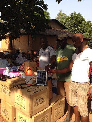 Richard explaining to the villagers how the lamps work.