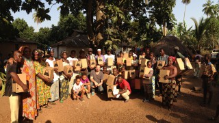 handing out the lamps to the villagers of Domingya, Guinea, with the non-profit-organisation  "les petits anges de guinée".